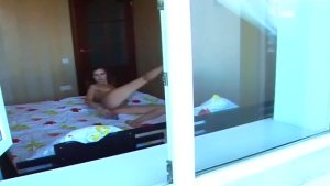 Girl spied through window masturbating