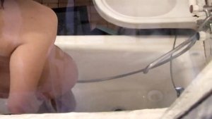 Naked and wet blonde spied in the shower