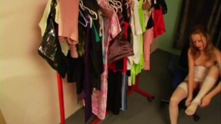 Half naked doll on fitting room spy cam