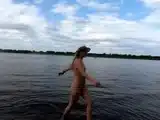Exhibitionist Blonde Goes Nude on a River Beach