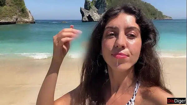 Hottie sucks my dick on a public beach and walks along the shore with cum on her face – Cumwalk