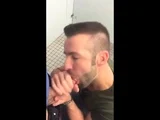 Hunk gives blowjob in a public restroom – amateur gay porn
