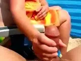 Beach handjob fun