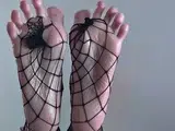 Beautiful feet covered in cum on a rainy night