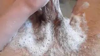 Extremely horny teen washes his dirty cock with shampoo in the bathtub