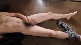 Flaccid and erect penis. Asian guy lay on the floor and masturbated. Jerk off