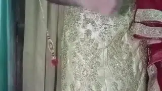 Indian gay Crossdresser Gaurisissy xxx sex in Golden Saree pressing his boobs and fingering his ass