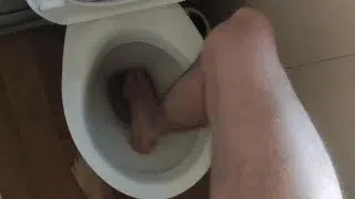 Pee fetish putting my long skinny legs into the toilet bowl full of piss