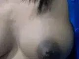 Squeezing Milk Out of Her Dark Nipples on Webcam