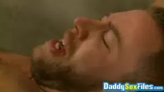 Large and hunky guy takes cock from his equally big partner